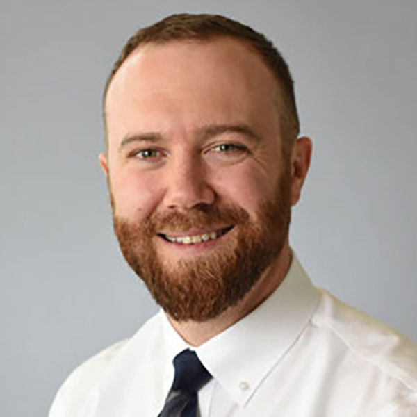 A headshot of Christopher James, MD.