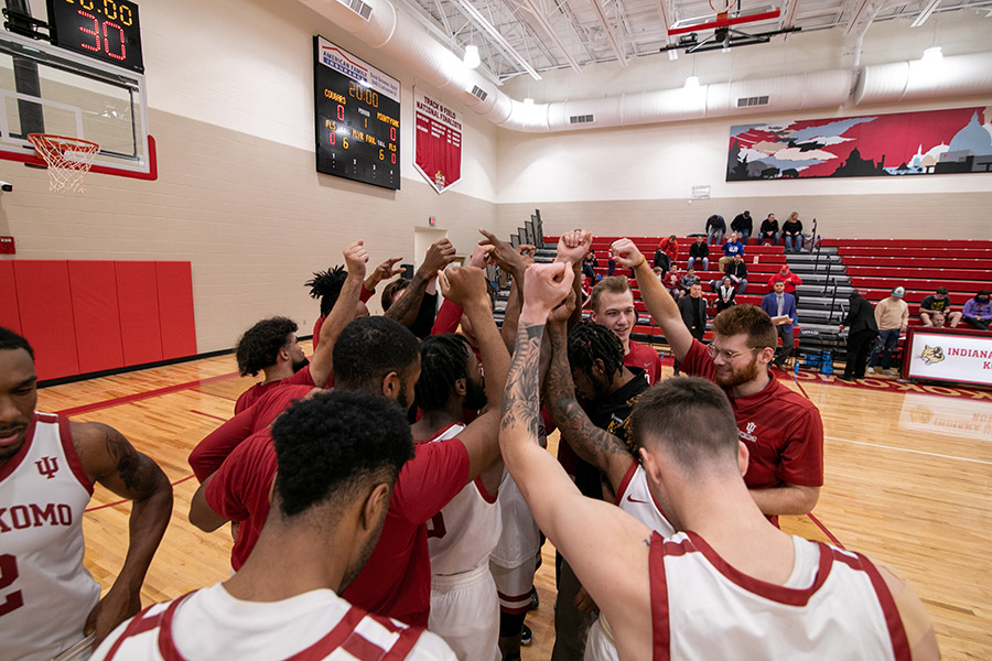 IU Kokomo men's basketball team on the court.