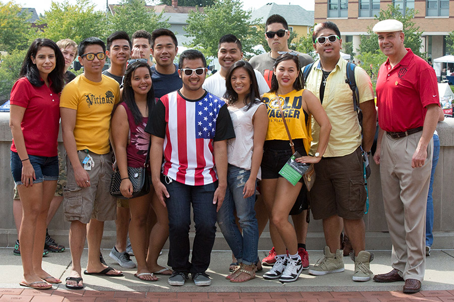 A group of Latino Alumni Association members posing for a photo.