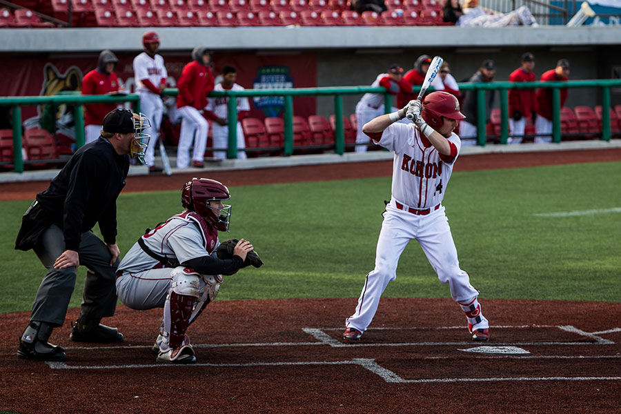 An IU Kokomo baseball player bats at home plate.