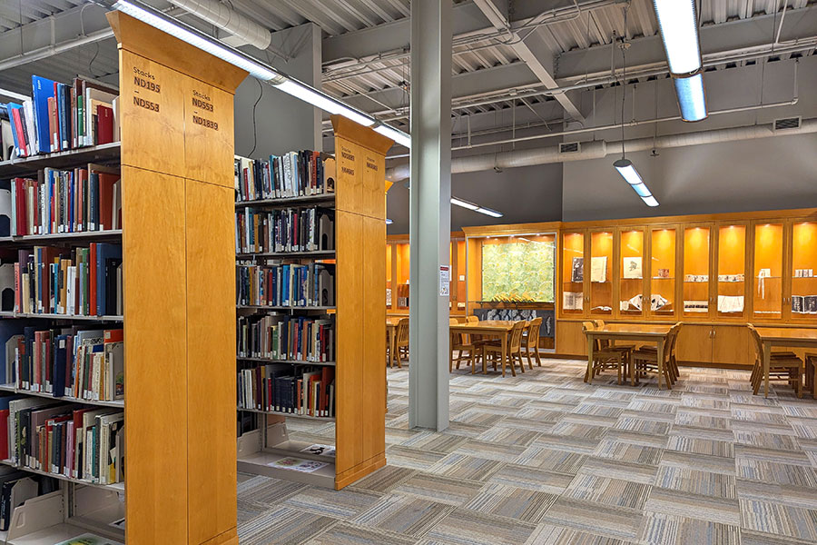 An interior shot of the library with display cases.