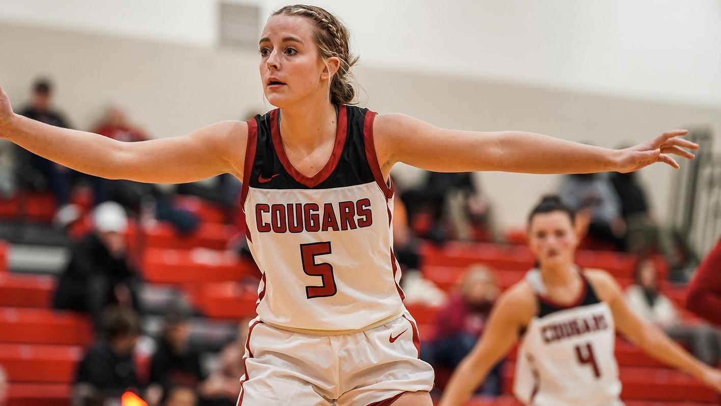 An IU Kokomo women's basketball player gets ready on defense.